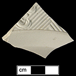 Plate rim sherd from 18QU124, molded with what is most likely the Chinese rail/basket  pattern shown here in a whole plate example from(Skerry and Hood), Lot 32.